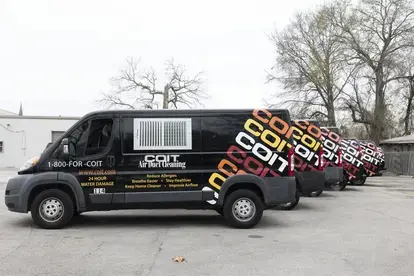 COIT Vans in Parking Lot